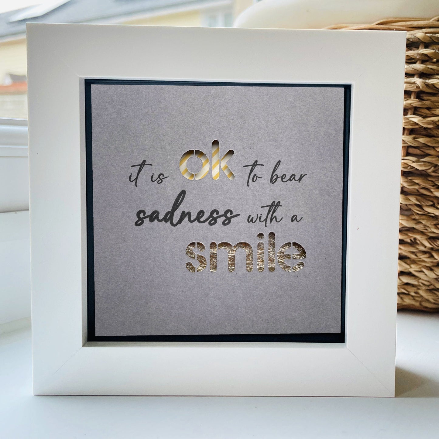 It’s OK to bear sadness with a smile Quote 1